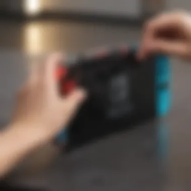 Demonstration of proper cleaning technique on Nintendo Switch screen