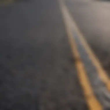 Close-up of asphalt being meticulously laid down with precision