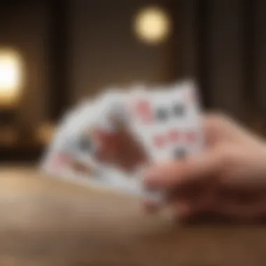 Elegant hand holding a classic solitaire card